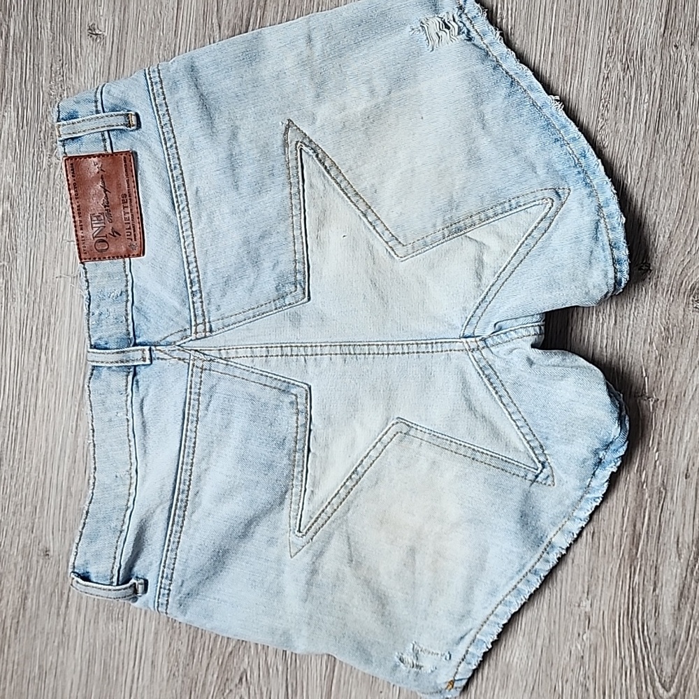 Light Wash Distressed Denim Shorts - Women's